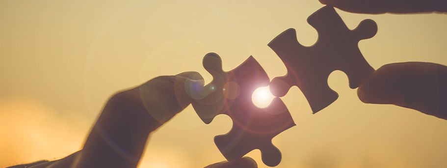 Gemeinschaft im Unternehmen - Puzzle wird zusammengesetzt